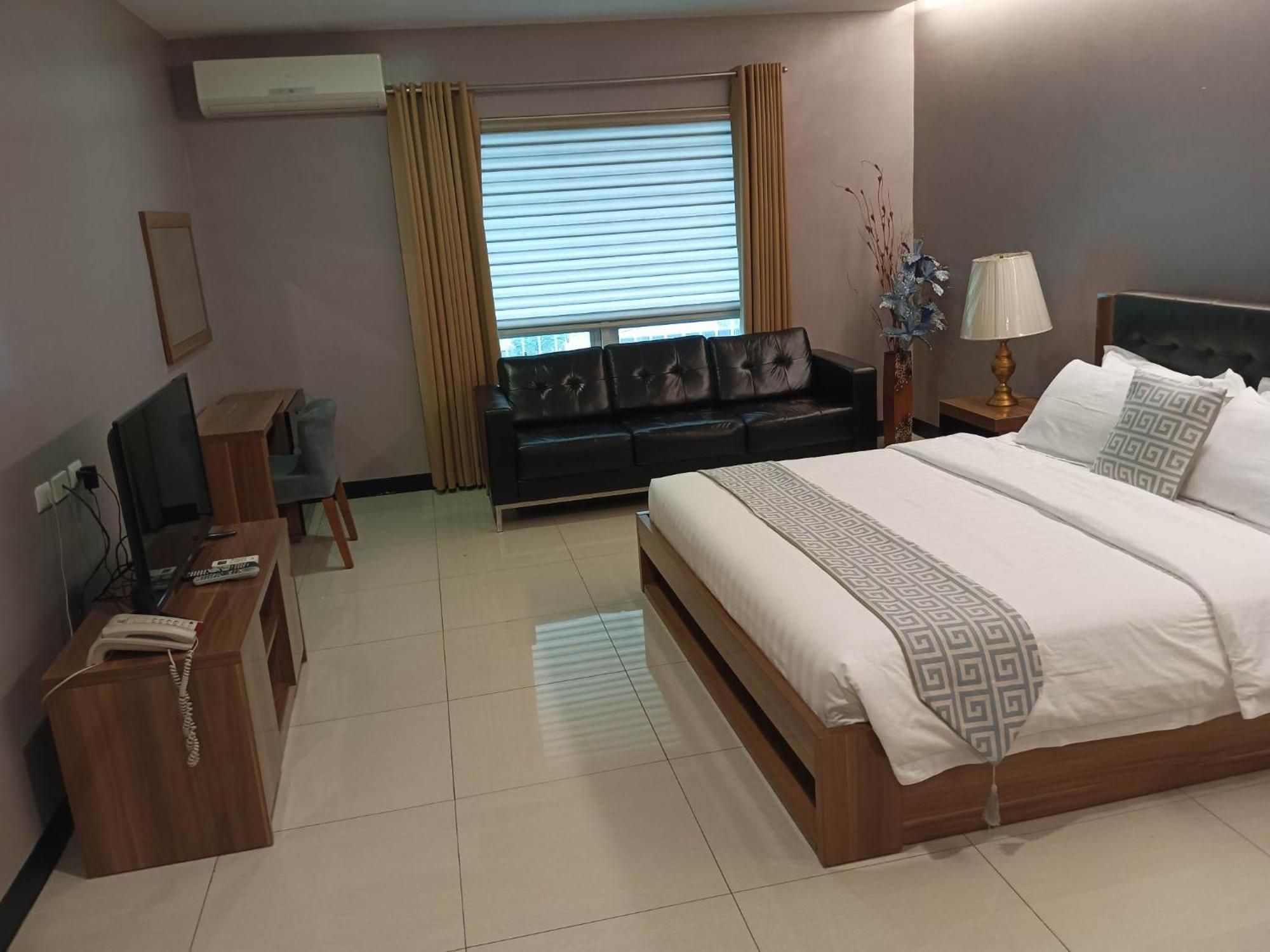 Ybc Grand Hotel Olongapo Δωμάτιο φωτογραφία